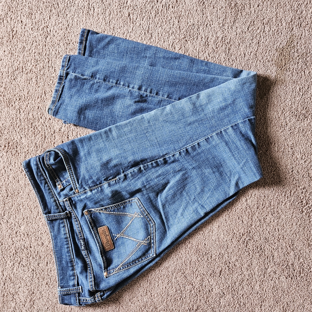 Wrangler Blue Boot Cut Jeans with Faded Finish